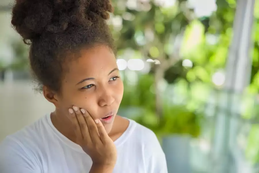 A young woman needs her wisdom teeth removed